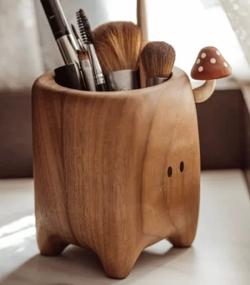 A stylish wooden storage box featuring a unique mushroom design, ideal for organizing your space while adding a natural decorative element